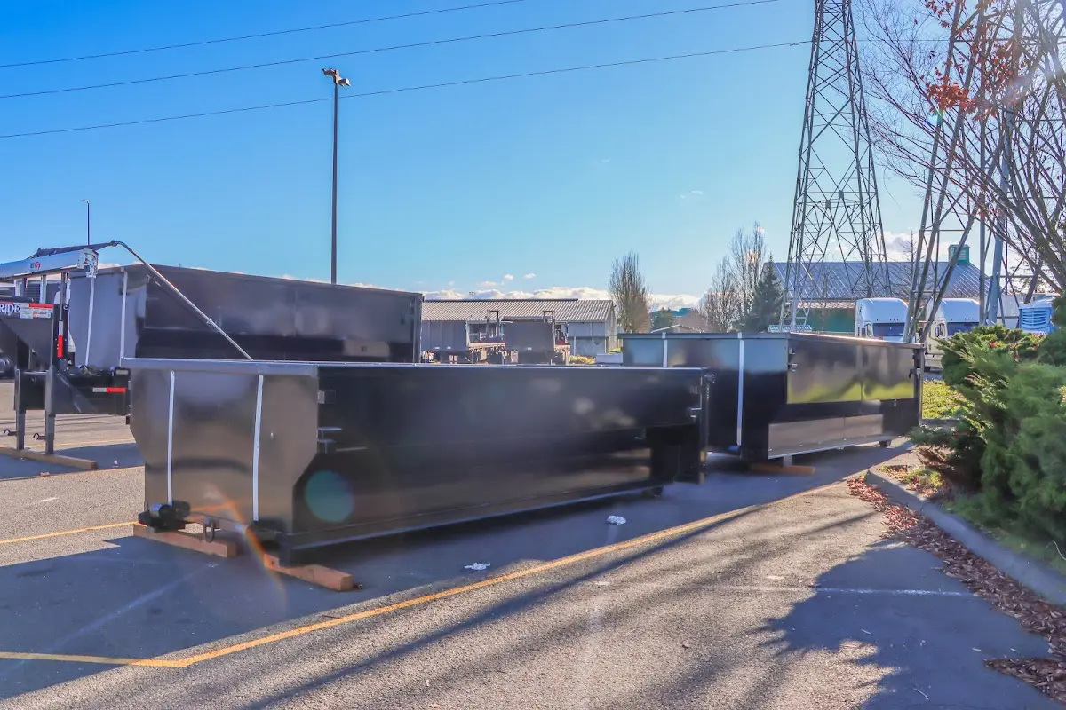 Roll-off dumpster ready for waste disposal at job site for 3 Yard Dumpster Rental in Mantua